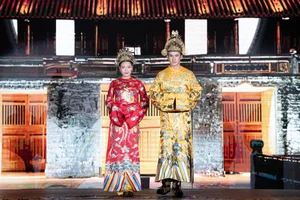 Luong The Thanh and Thuy Diem Exude Elegance in Dragon and Phoenix Ao Dai - image 7