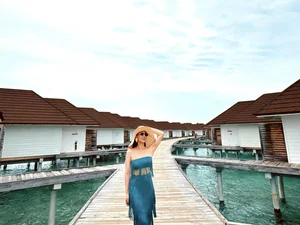 Lã Thanh Huyền Stunning Vacation Style: Exploring Elegant Sheer Dress Trends and Summer Travel Fashion Inspiration - image 3