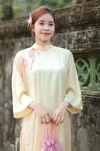 Graceful Vietnamese Girl in Traditional Ao Dai  Discover Timeless Beauty and Elegance - image 1