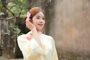 Graceful Vietnamese Girl in Traditional Ao Dai  Discover Timeless Beauty and Elegance - image 2
