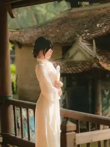 Graceful Asian Beauty: A Vietnamese Woman in Traditional Attire, Evoking Timeless - image 5