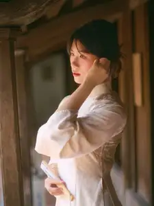 Graceful Asian Beauty: A Vietnamese Woman in Traditional Attire, Evoking Timeless - image 1