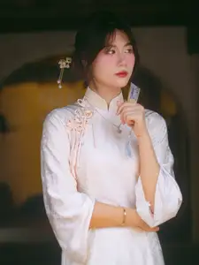 Graceful Asian Beauty: A Vietnamese Woman in Traditional Attire, Evoking Timeless - image 3
