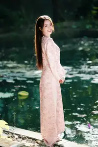 Vietnamese Charm: Elegant Beauty in Pink Traditional Attire - image 17