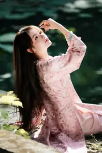 Vietnamese Charm: Elegant Beauty in Pink Traditional Attire - image 10