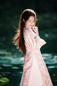 Vietnamese Charm: Elegant Beauty in Pink Traditional Attire - image 12