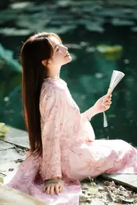 Vietnamese Charm: Elegant Beauty in Pink Traditional Attire - image 13