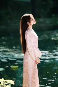 Vietnamese Charm: Elegant Beauty in Pink Traditional Attire - image 9