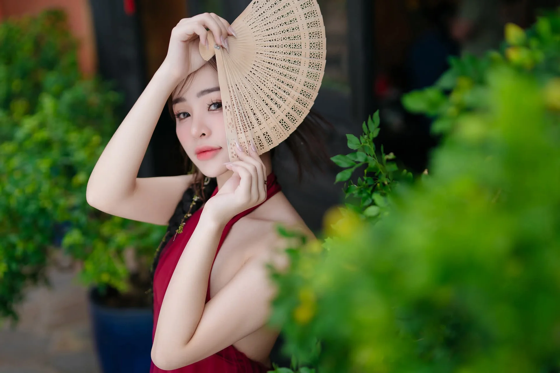 Capture the Essence of Asian Charm: Modern Red Dress with Elegant Traditional Motifs for Sophisticated Fashion Lovers