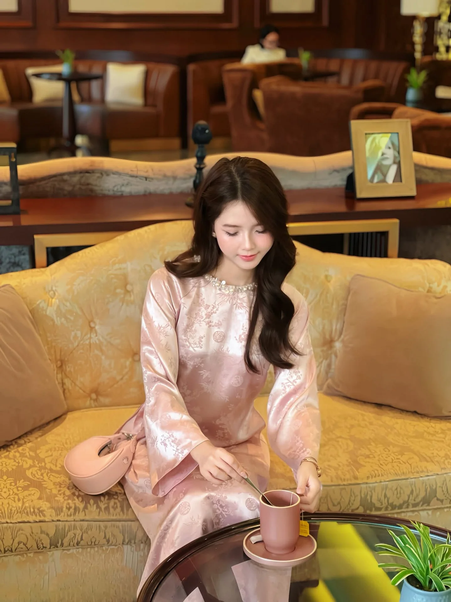 Graceful Pink Ao Dai: Elegant Beauty of Vietnamese Women