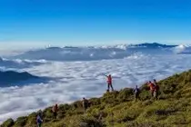 Cloud Hunting Khe Sanh: Romantic Couple Embraces Majestic Clouds & Wind Turbines
