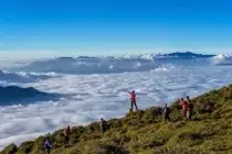 Cloud Hunting Khe Sanh: Romantic Couple Embraces Majestic Clouds & Wind Turbines - image 0