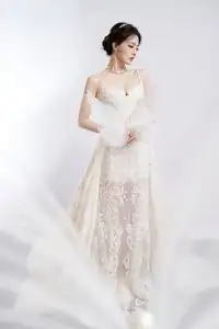 Ethereal Beauty: Model in Elegant Lace Wedding Gown | Chic Evening Dress Design - image 15
