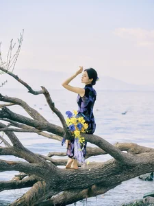 Ethereal Elegance: Ju Xiao Tao’s Blue Cheongsam Serenity at Erhai Lake - image 3