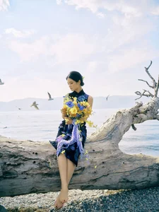 Ethereal Elegance: Ju Xiao Tao’s Blue Cheongsam Serenity at Erhai Lake - image 21