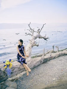Ethereal Elegance: Ju Xiao Tao’s Blue Cheongsam Serenity at Erhai Lake - image 5