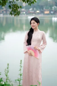 Graceful Muse in Traditional Pink Ao Dai - image 6